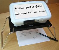 OLYMPIA - TELEAGRANDISSEUR PORTABLE...