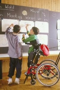 JUNIOR 50350 - FAUTEUIL ROULANT MANUEL A VERTICALISATION...