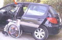 PORTE ESCAMOTABLE ET TREUIL DE CHARGEMENT - BRAS ELEVATE...